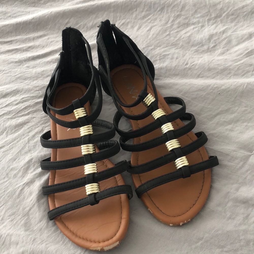 Black and gold sandals